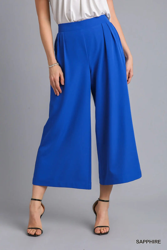 Cropped pants with pleats