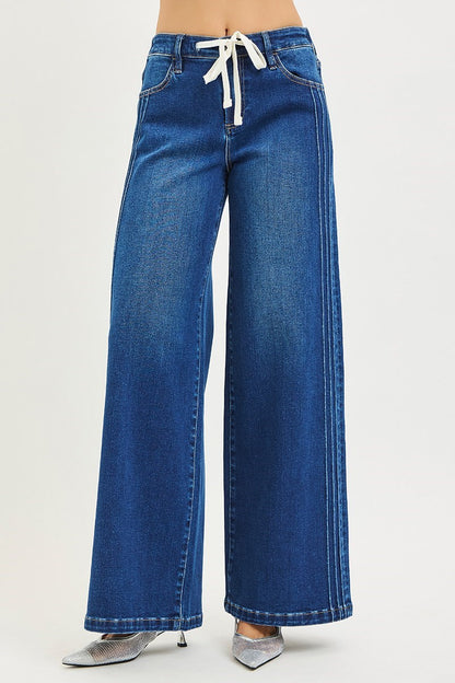 ELASTIC BAND MID RISE WIDE LEG JEANS WITH SIDE PINTUCK DETAIL AND FRONT DRAWSTRING