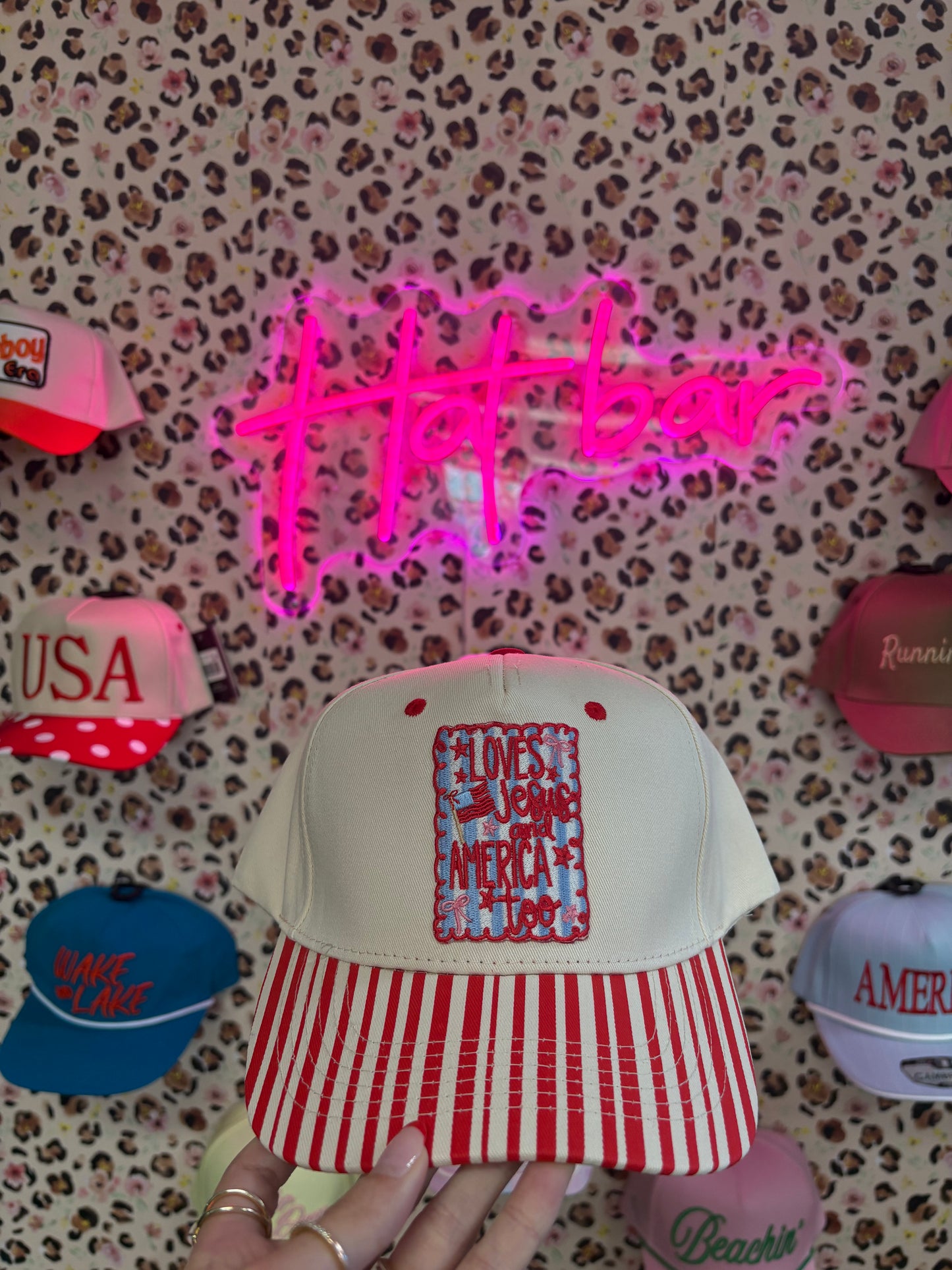 “Loves Jesus and America too” trucker hat